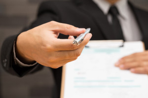 Businessman signing a contract